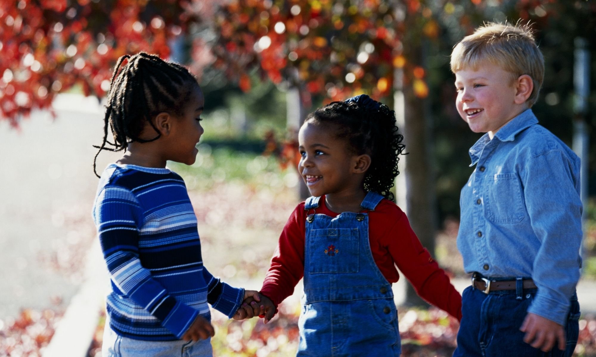 Children chatting with each other during a nursery drop off