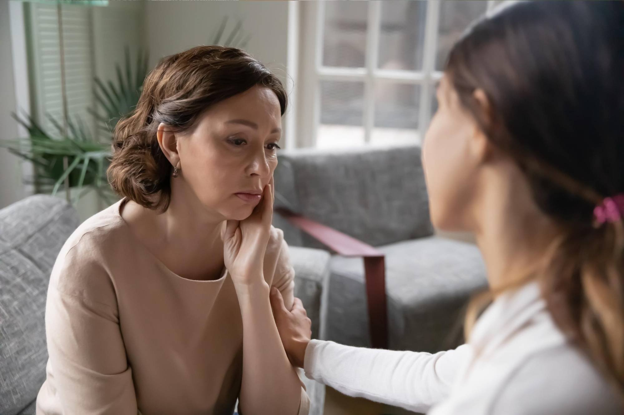 New parent comforted and getting tips on mental well-being