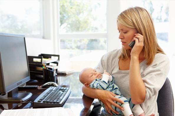 Worried mother holding her baby and calling for guidance