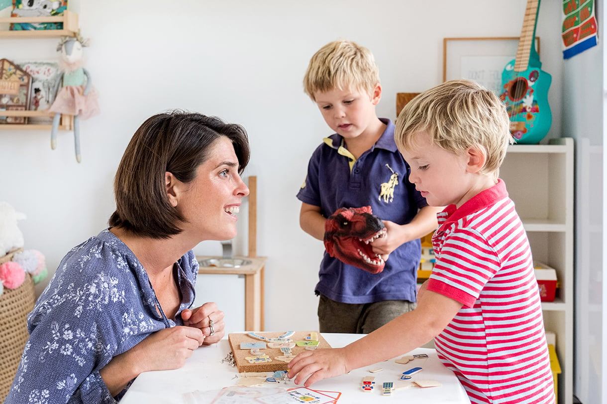 Photo of Occupational Therapist Rachel Carey and her two children playing together