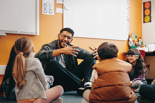 Children on the floor of a classroom