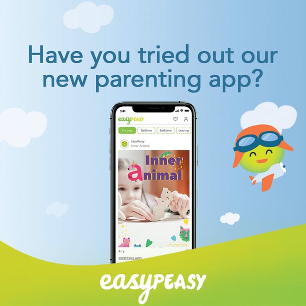 EasyPeasy mobile app displayed on a background with green hills, and blue sky inviting parents to give feedback on our iOS app
