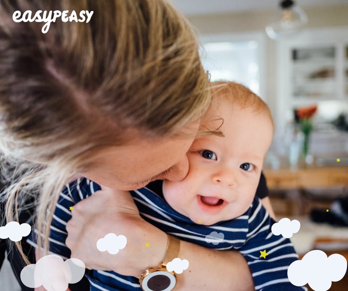 Photo of a mother kissing her baby on the cheek Facebook