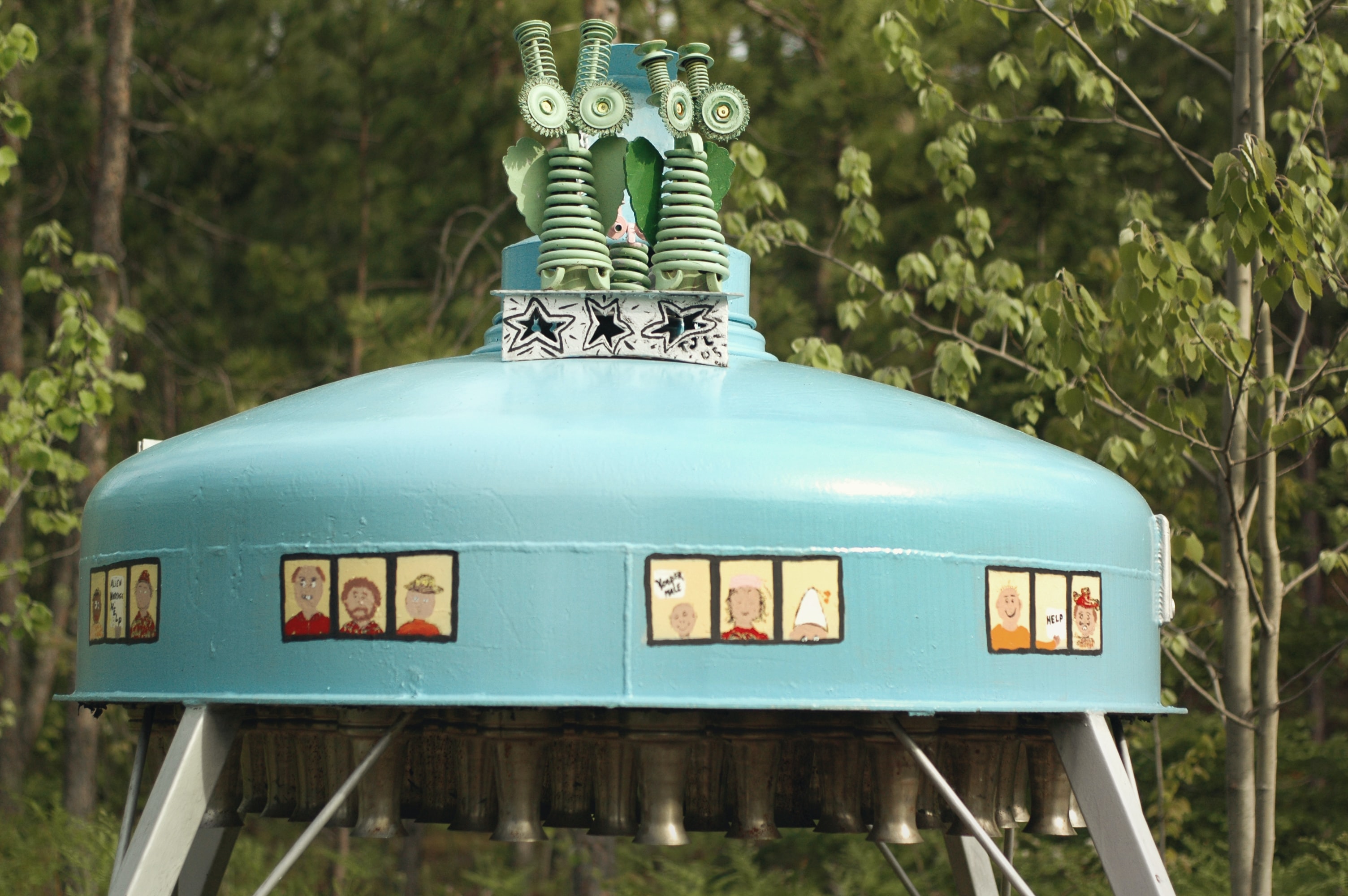 teal space ship made from recycled materials