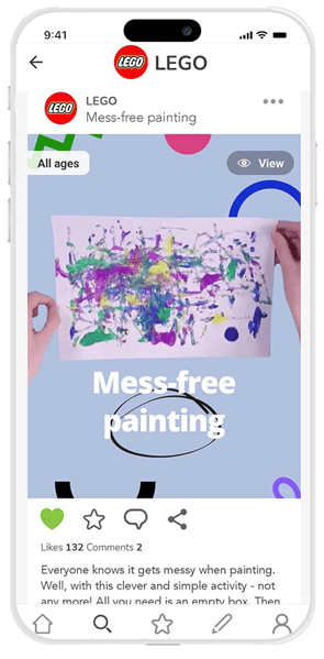 The EasyPEasy app showing the Mess-Free painting content. A piece of paper with paint splatters is being held up by two hands
