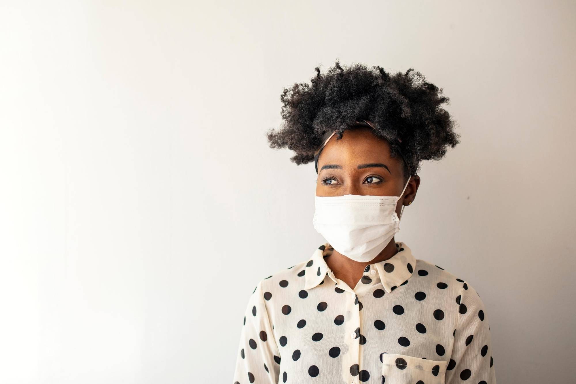 New mother wearing a face mask during lockdown